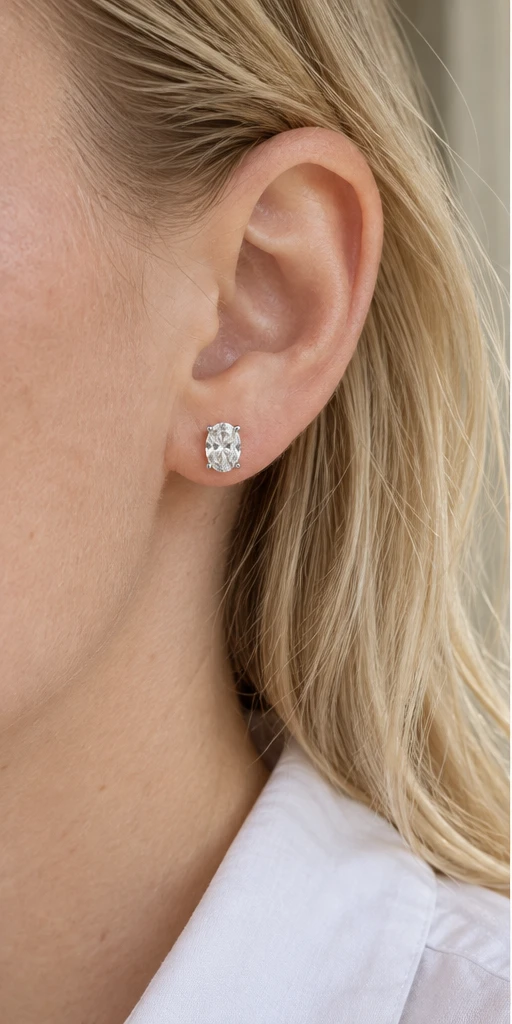 Oval Solitaire Lab-Grown Diamond Stud Earrings — editorial styling