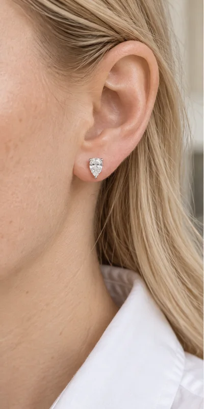 Pear Solitaire Lab-Grown Diamond Stud Earrings editorial styling